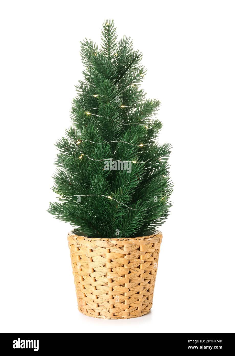 Small Christmas tree with glowing lights on white background Stock