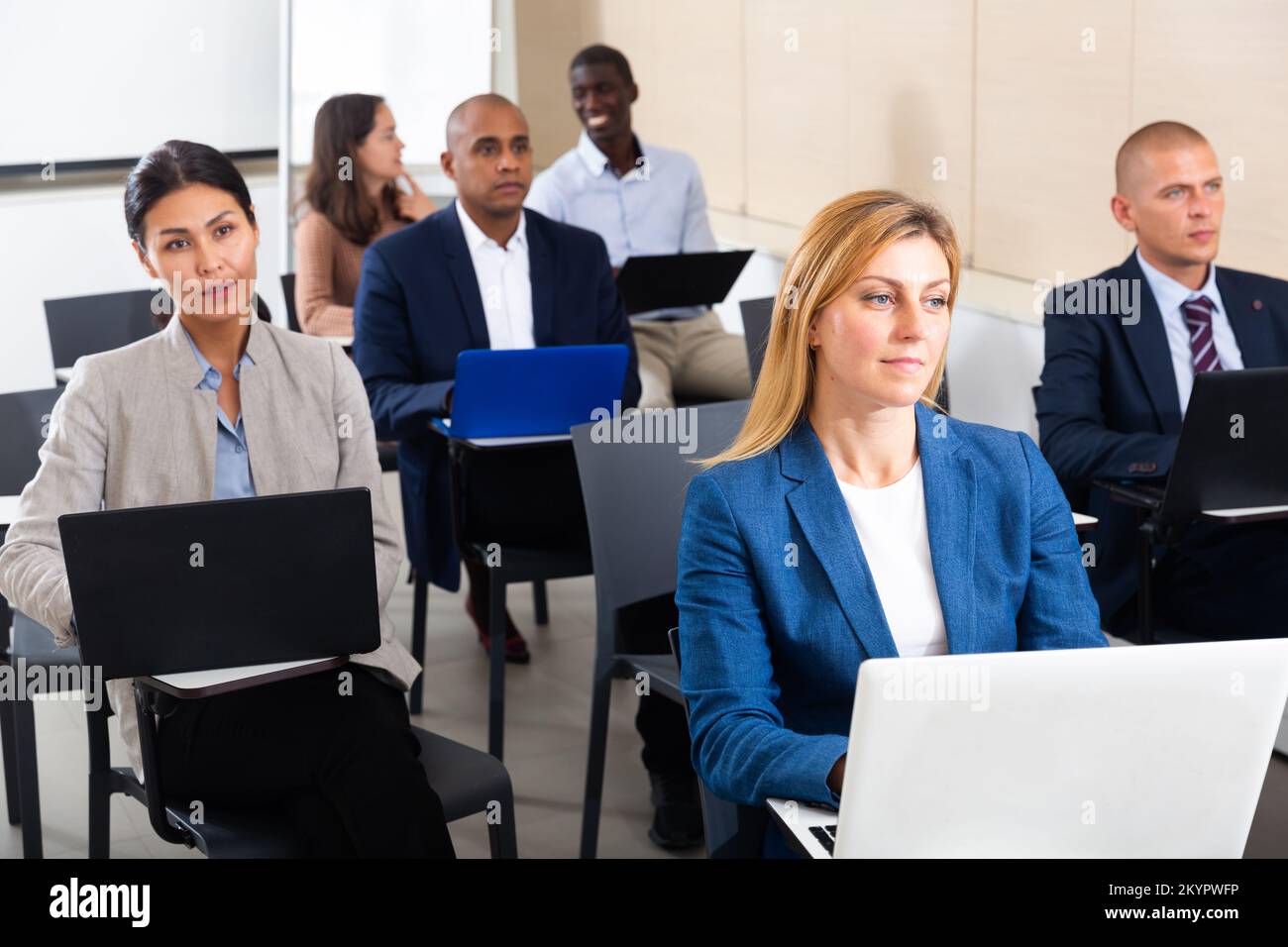 International group of business people are working on computers in ...