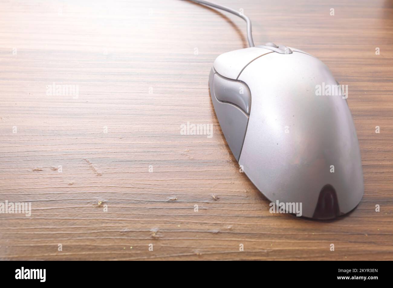 Modern computer mouse with wooden background and copy space Stock Photo ...