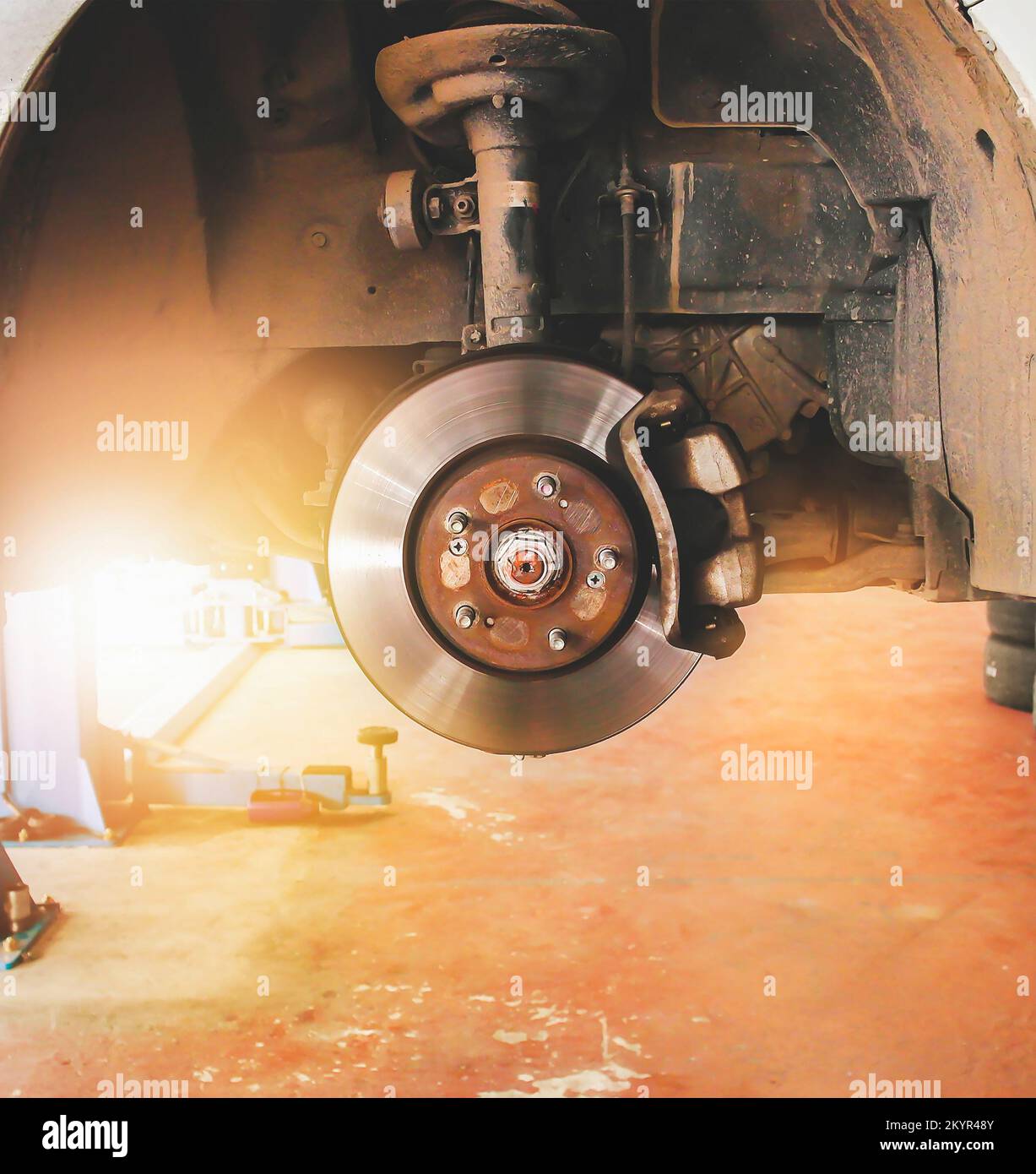 Disc brakes and calipers that remove the wheels of a car in the auto