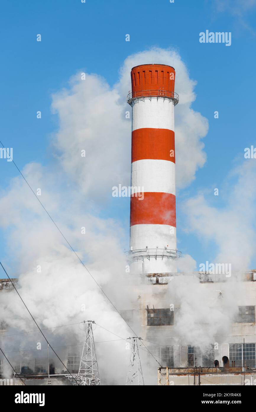 Emission of caustic toxic steam smoke at the plant pipe industry and