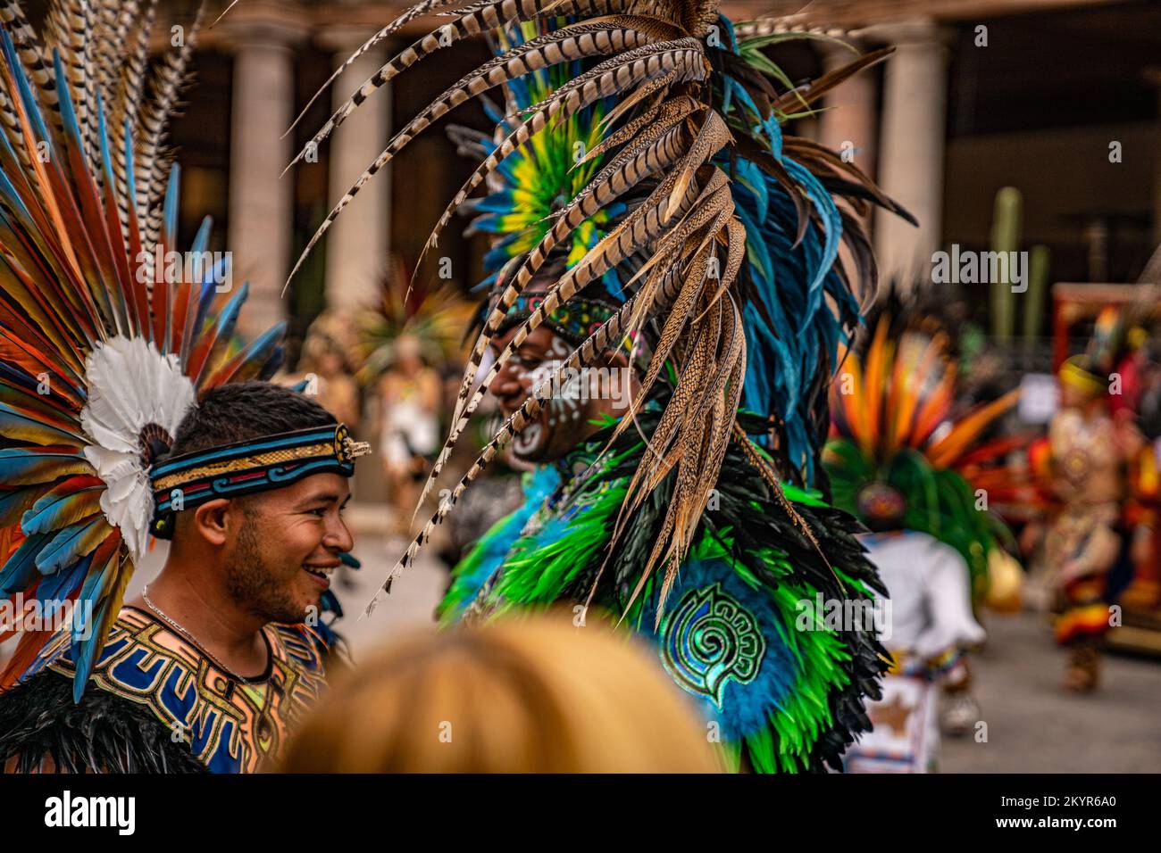 Indigenous men in colorful attire at the Danza de Indios gathering of native tribes in San Miguel de Allende, Mexico Stock Photo