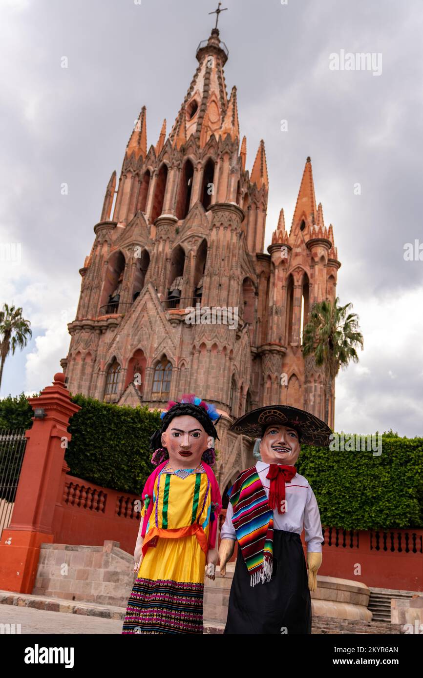 Costumed performers in full bodysuit posing in front of the Parroquia de San Miguel Arcángel, in San Miguel de Allende, Mexico Stock Photo