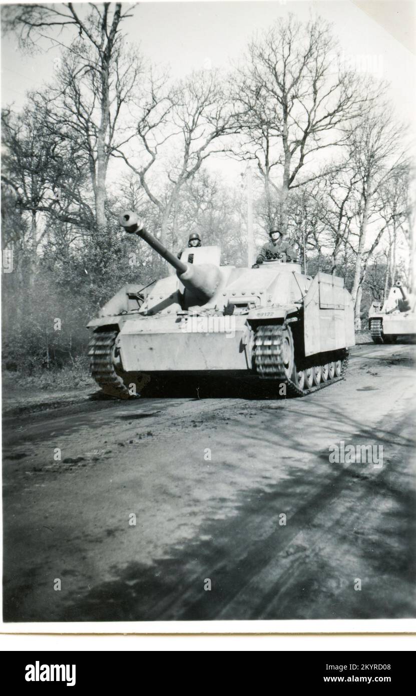 World War Two German Assault Guns Advance on road on the Western Front 1944 Stock Photo