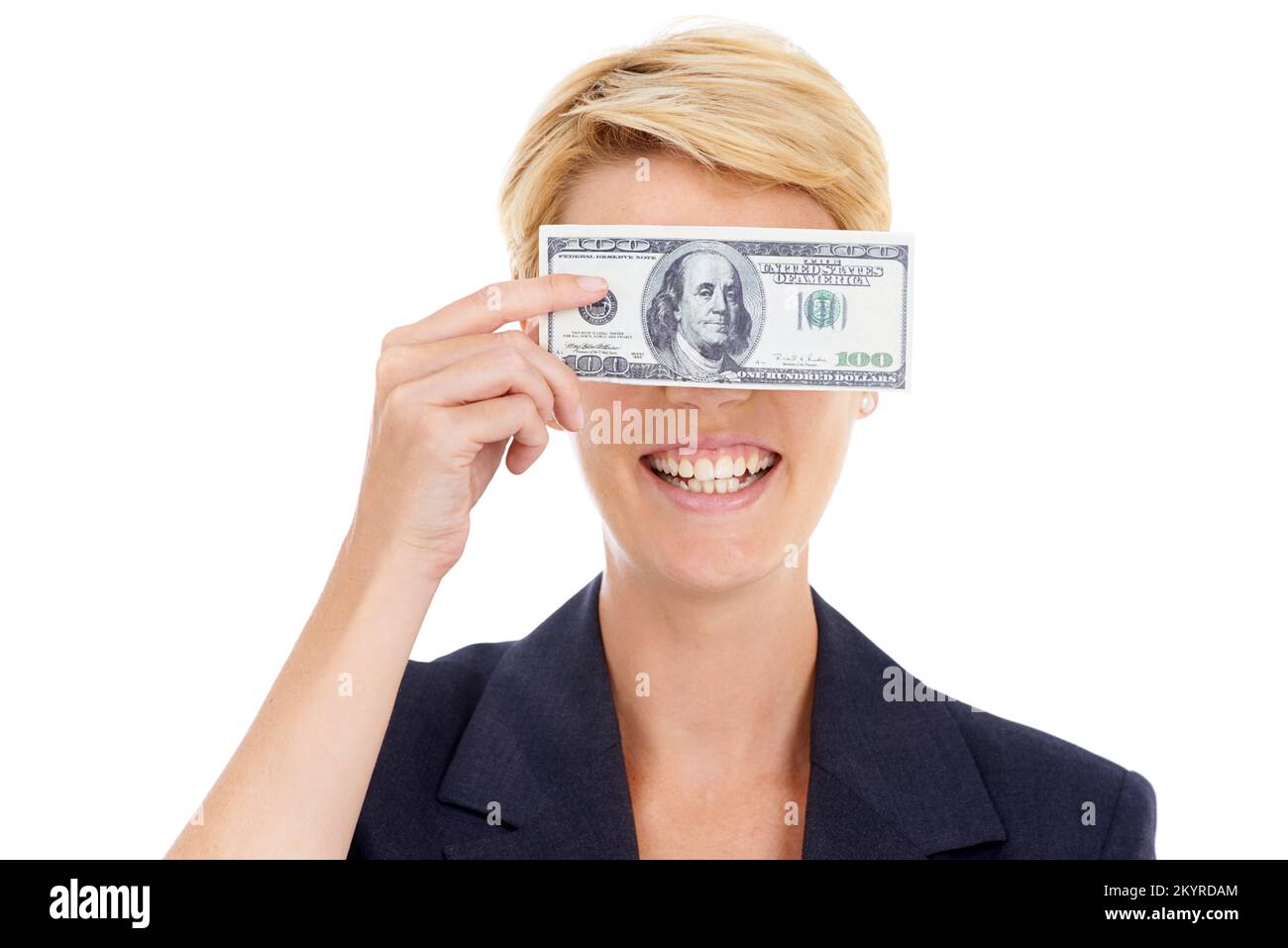 Money makes me smile. A young businesswoman holding a 100 dollar bill in front of her eyes. Stock Photo
