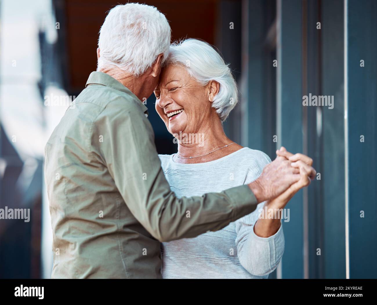 Senior couple, dance and happy smile, love and romance outdoor together, support or trust in marriage relationship. Elderly man, woman or relax while Stock Photo