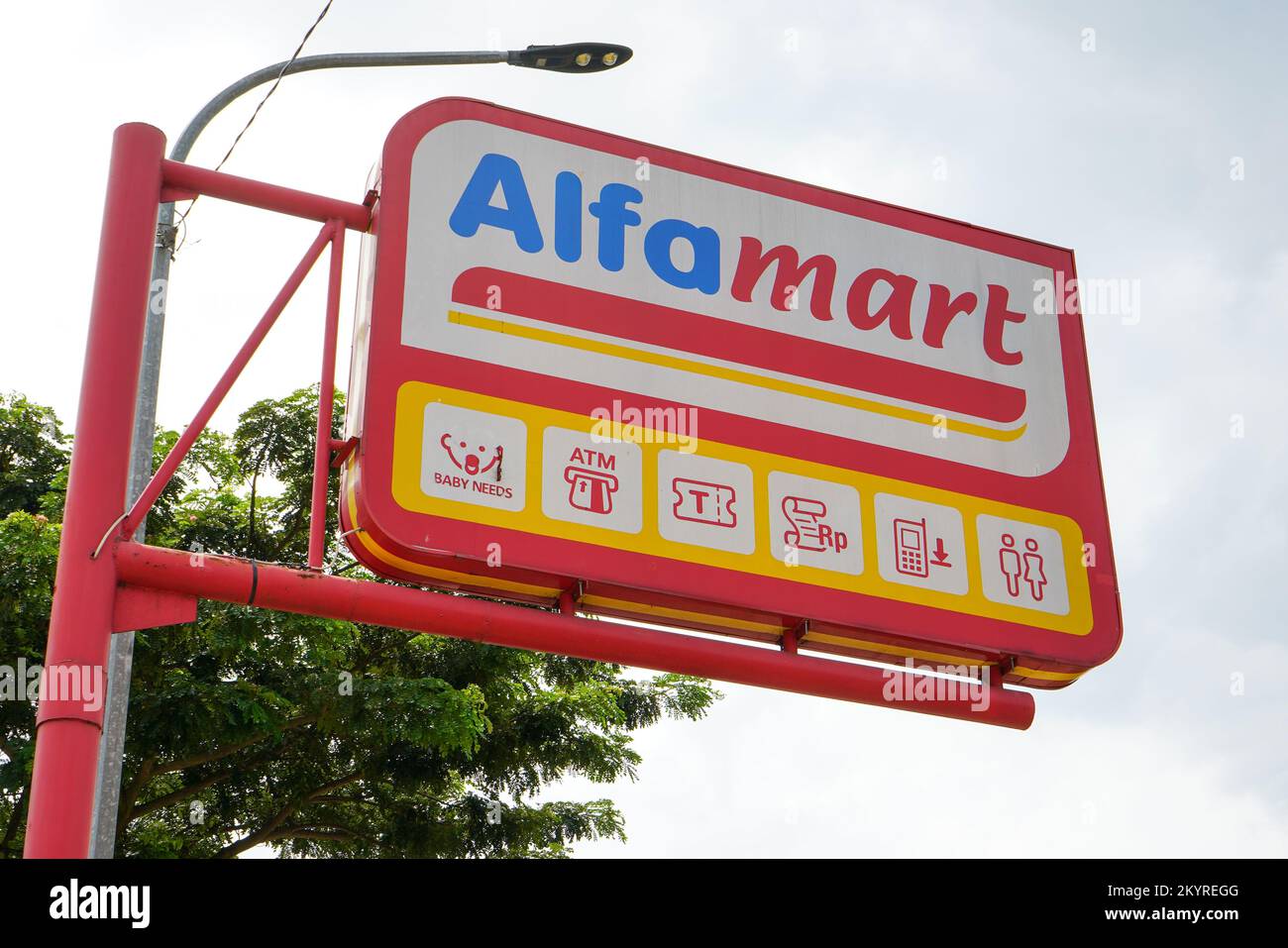 Kudus Indonesia - August, 2023 : PT Sumber Alfaria Trijaya Tbk or Alfamart is a primarily-franchised Indonesian convenience store chain, with stores Stock Photo