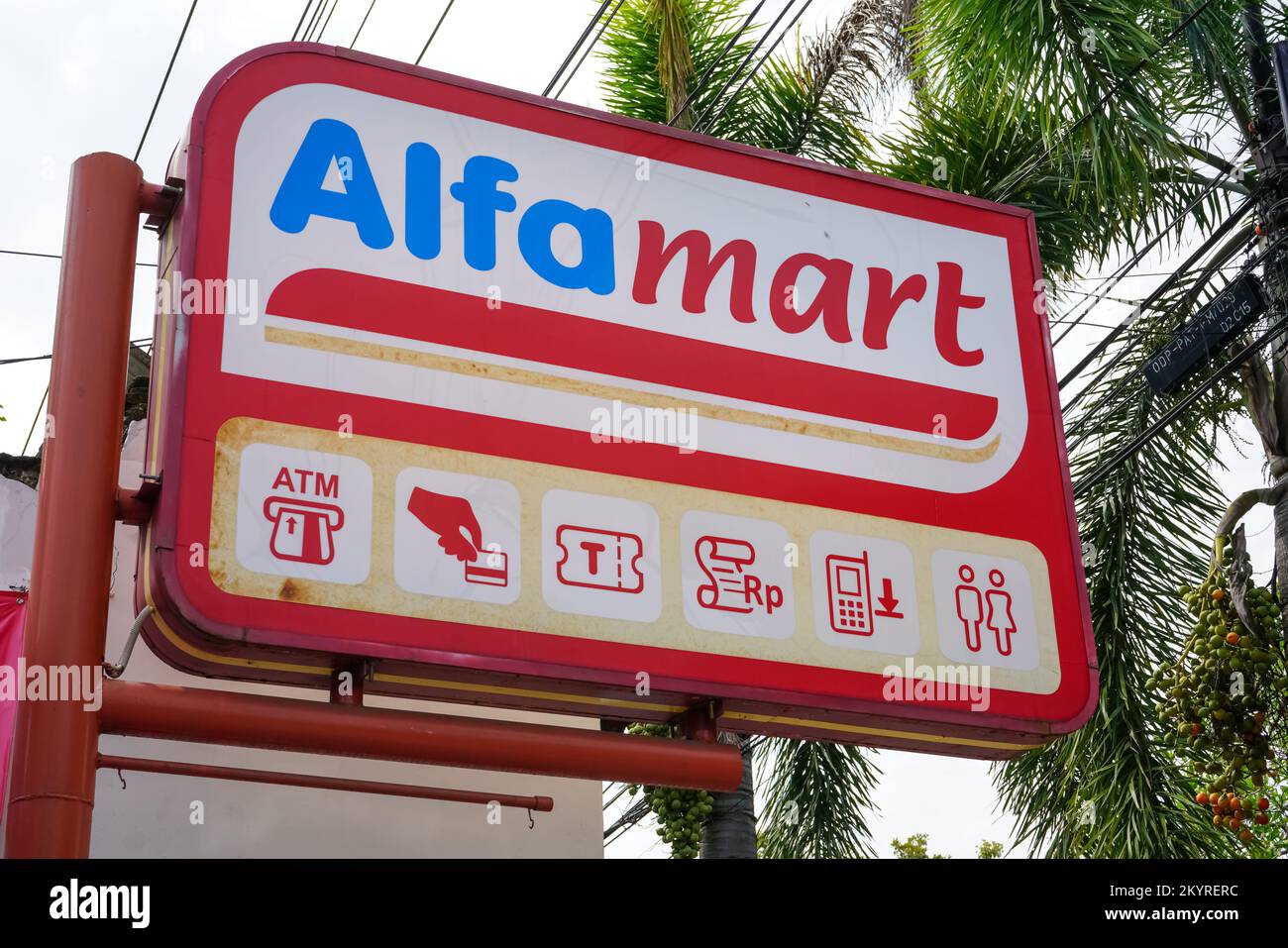 Kudus Indonesia - August, 2023 : PT Sumber Alfaria Trijaya Tbk or Alfamart is a primarily-franchised Indonesian convenience store chain, with stores Stock Photo