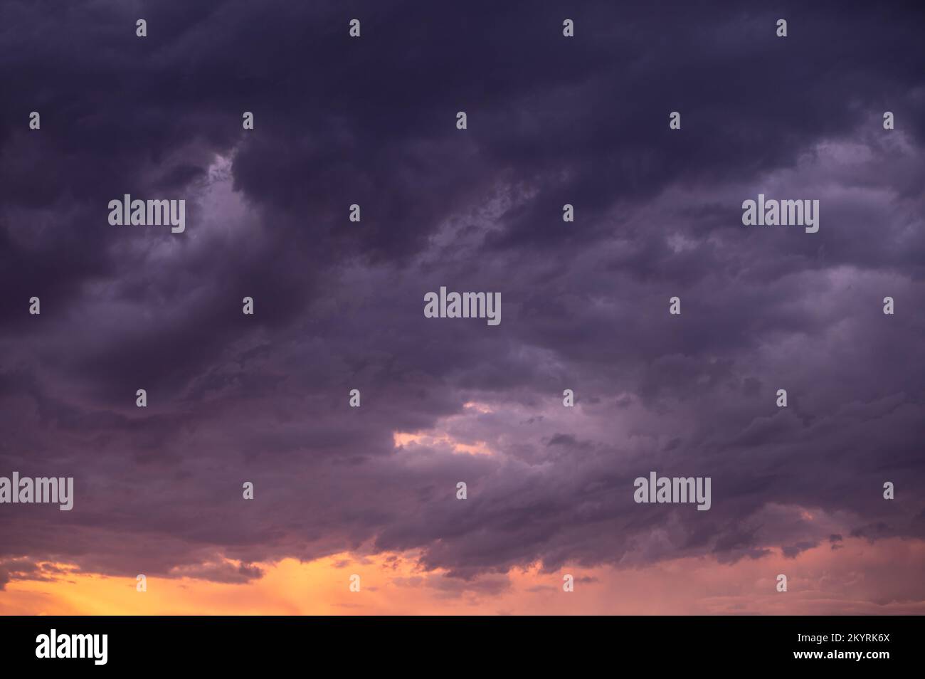 Dark clouds seen in sky shot from low angle Stock Photo