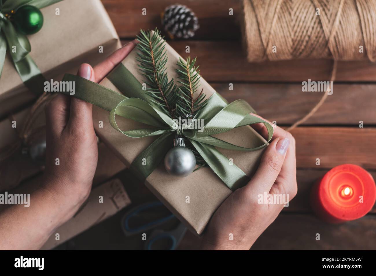 Flat lay composition with Christmas gift boxes and decor on wooden table Stock Photo