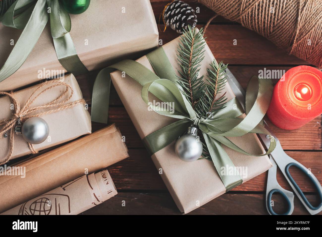 Flat lay composition with Christmas gift boxes and decor on wooden table Stock Photo