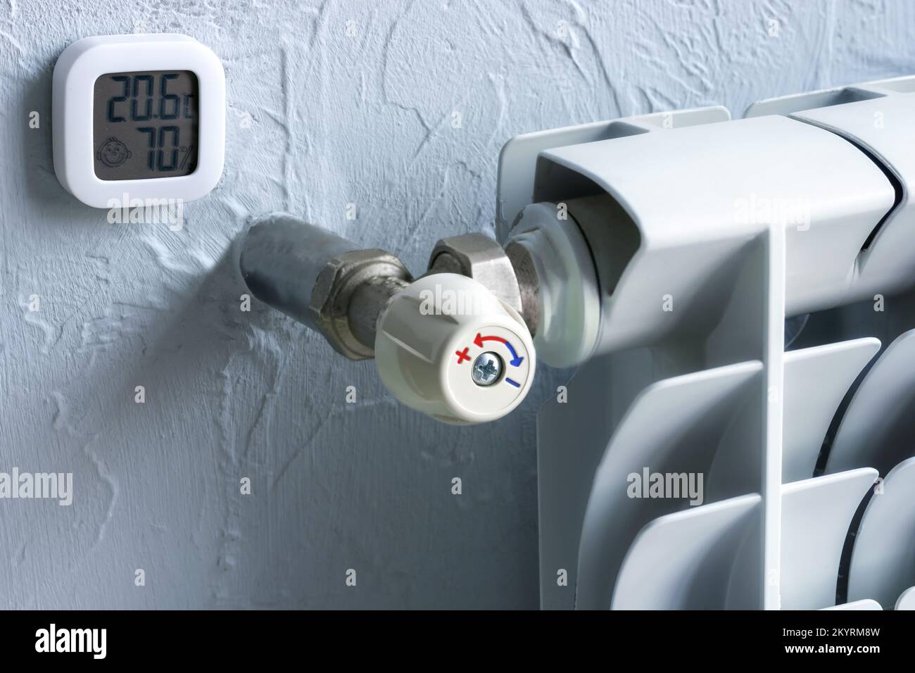 Heating radiator with temperature regulator. A thermometer that shows