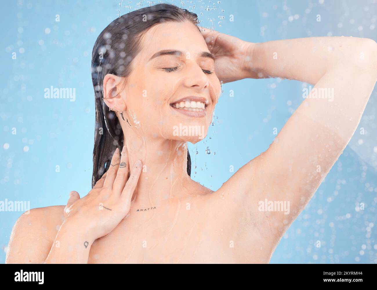 Woman, shower and cleaning for hygiene, bodycare and beauty with water