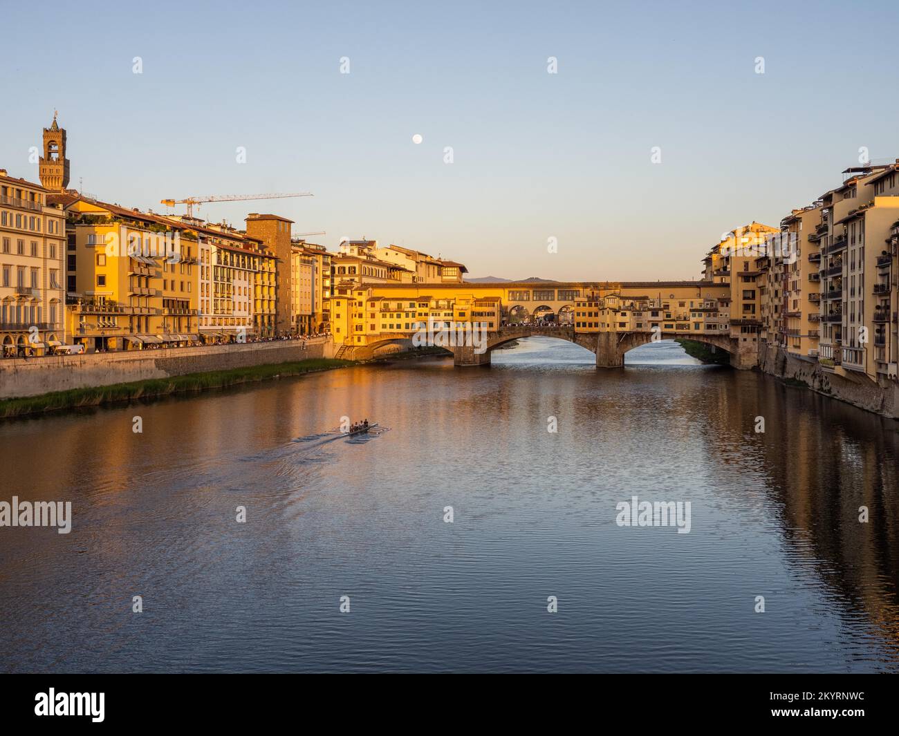 Evening atmosphere and full moon, Ponte Vecchio bridge over the river Arno, Florence, Italy, Europe Stock Photo