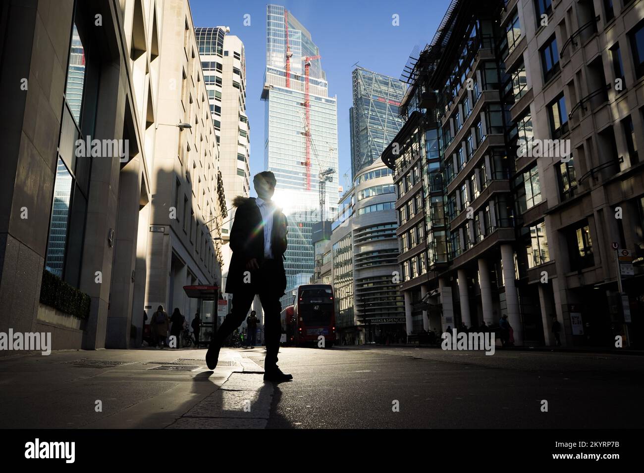 People walk through Spitalfields, London. Picture date: Thursday December 1, 2022. Stock Photo