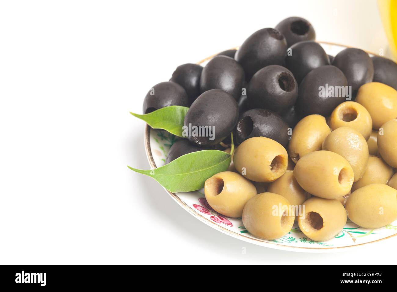 green and black olives isolated on white background. Stock Photo