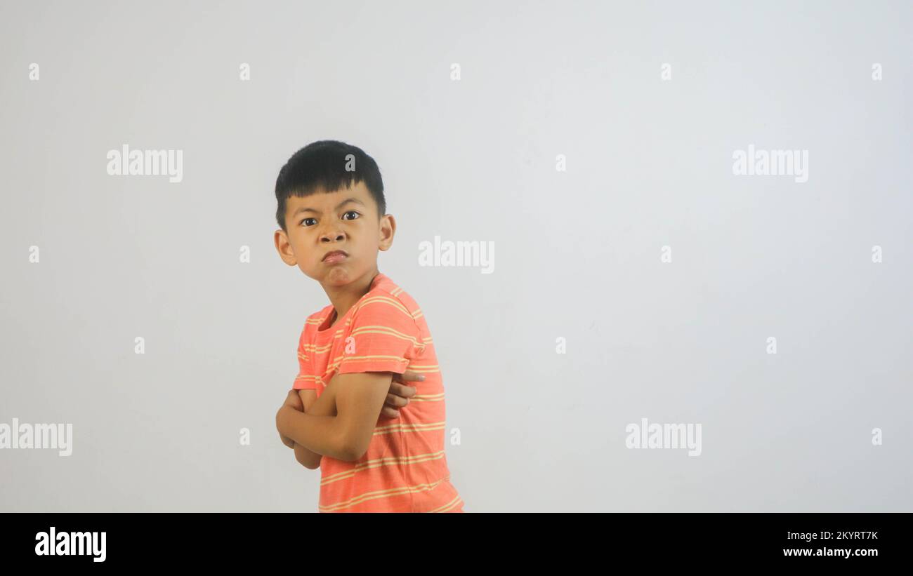 Cute Asian boy isolated on white background Stock Photo - Alamy