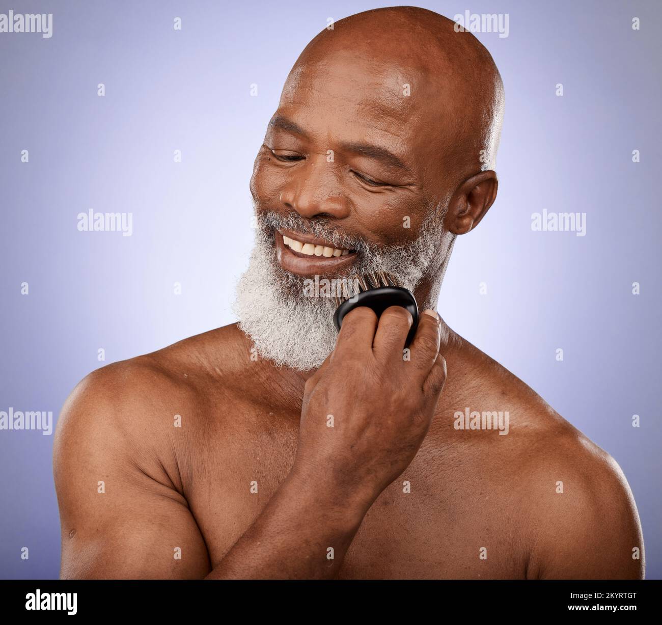 Beauty, brush and grooming with black man and beard for hair care, style or barber. Self care, hygiene and growth with face of old man for natural Stock Photo
