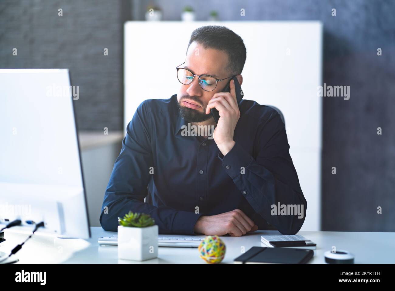 Male Man Talking On Mobile Phone Or Smartphone Stock Photo