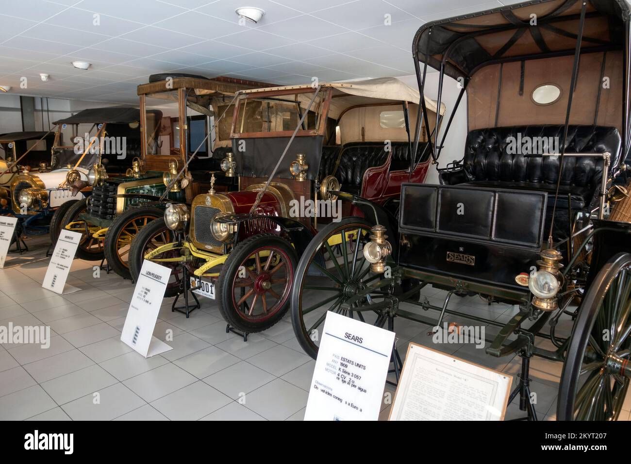 From right to left: Sears model K3 057 (1909).Lion Peugeot model VC (1905).Morisse model 4 (1900).Chenard Walker model TT (1904).Auto Museum.Andorra Stock Photo