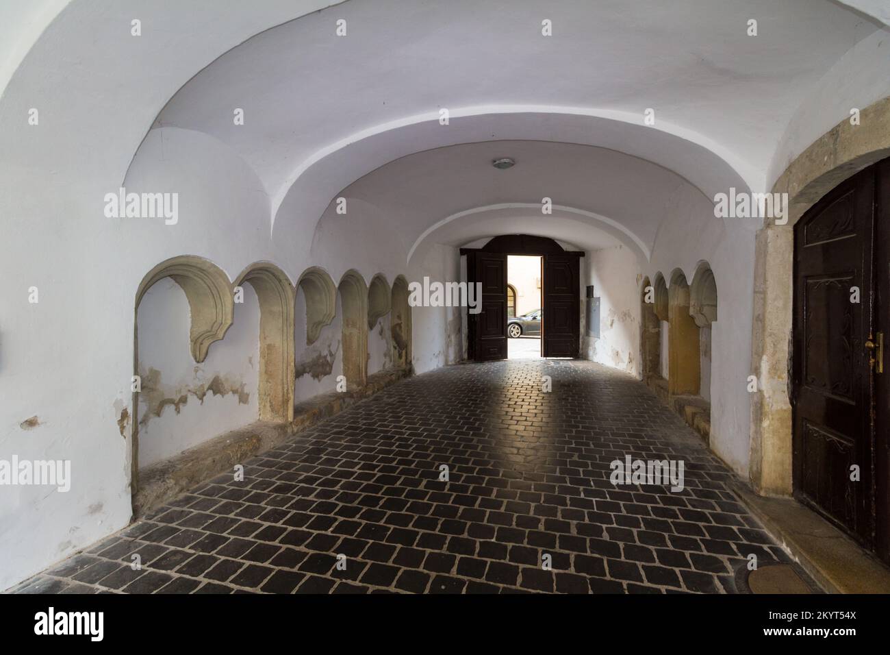 Medieval sedilia in gateway of old building, Sopron, Hungary Stock Photo