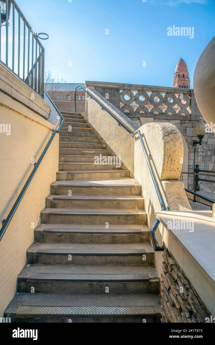 Stairway in San Antonio River Walk Texas that goes up to a bridge or