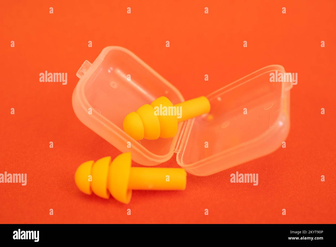 Silicone ear plugs for human ears on red background Stock Photo Alamy