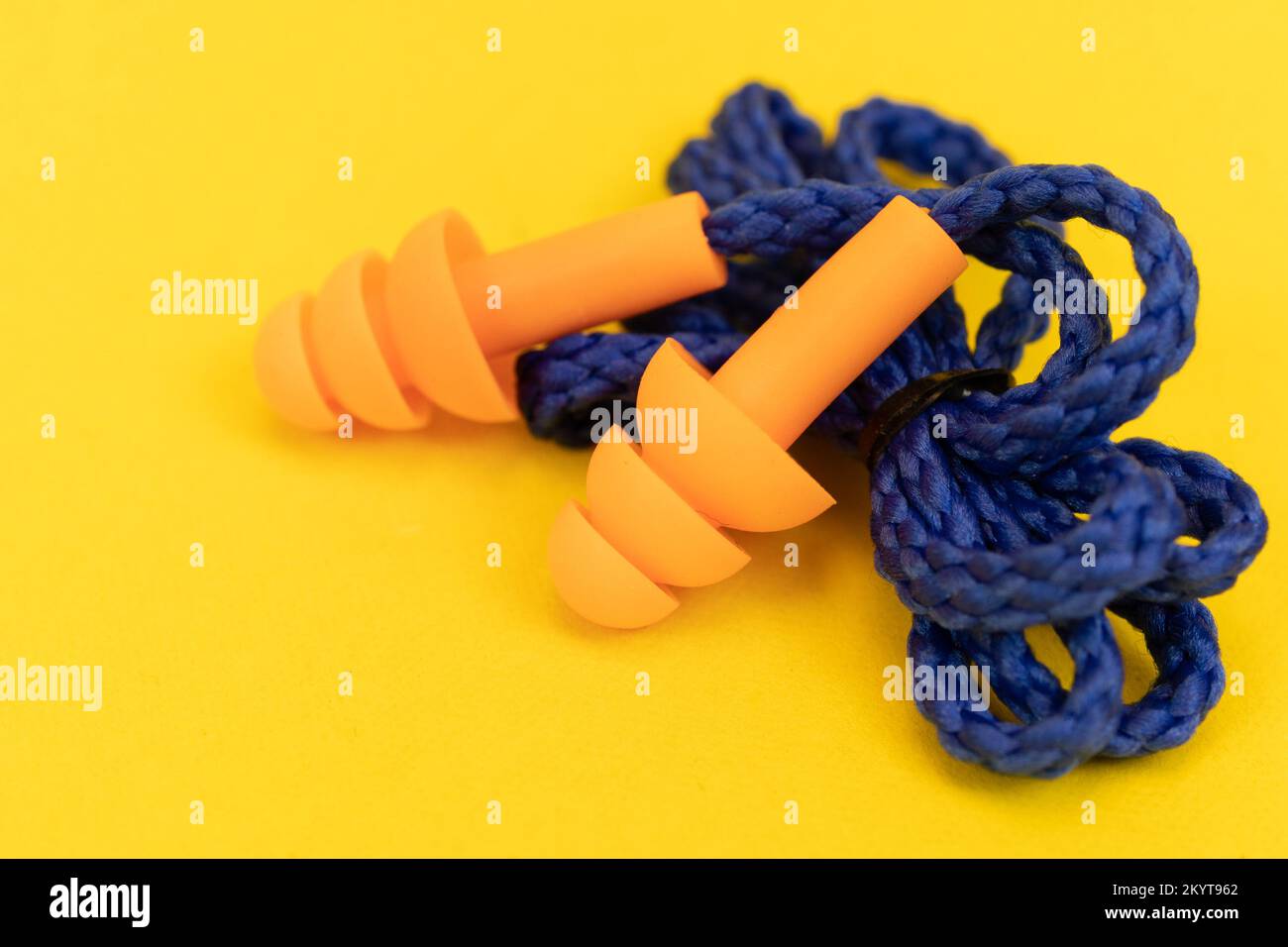 Silicone ear plugs for human ears on yellow background Stock Photo Alamy