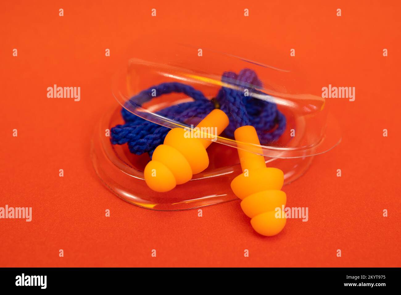 Silicone ear plugs for human ears on red background Stock Photo Alamy