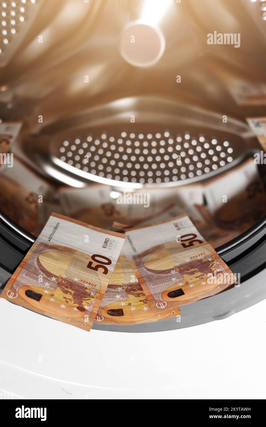 Euro money banknotes in washing machine - illegal cash 50 and mafia ...