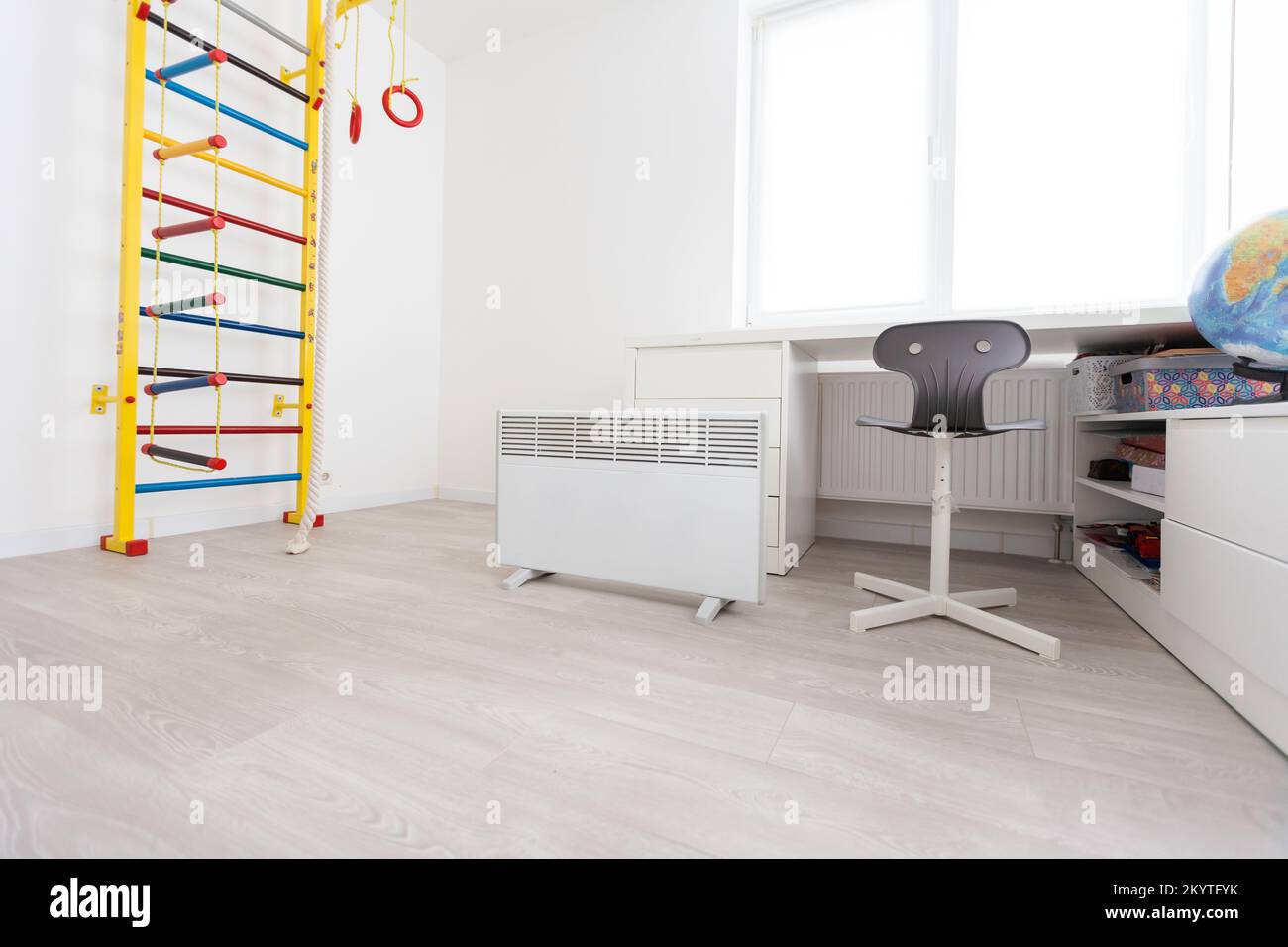 electric heater in the children's room Stock Photo Alamy