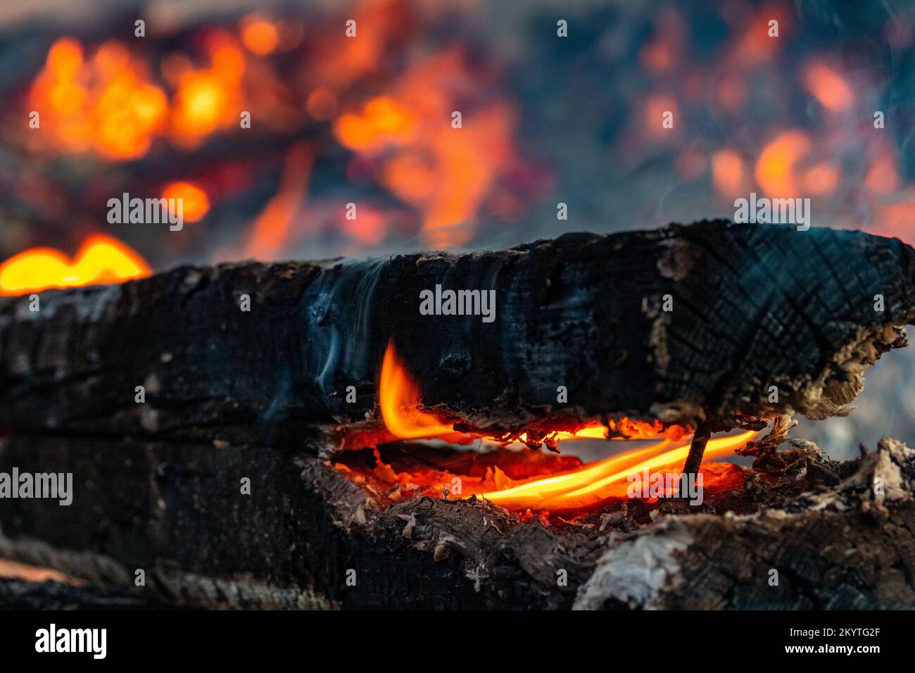 A piece of wood is burning from the inside Stock Photo Alamy