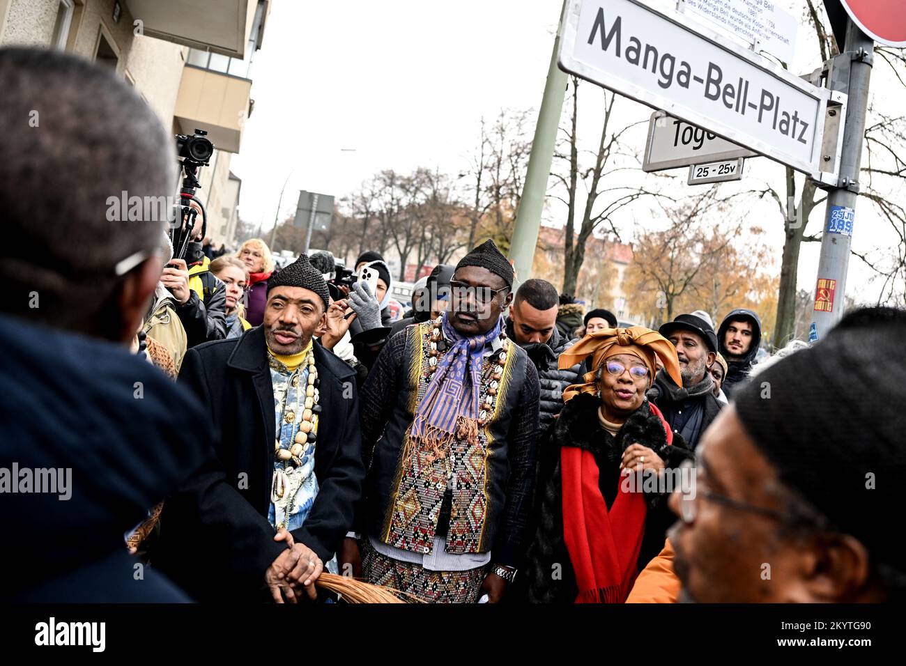 Berlin, Germany. 02nd Dec, 2022. King Jean-Yves Eboumbou Douala Bell (r) at the street renaming ceremony in the African Quarter. Nightingale Square' was renamed 'Manga Bell Square'. This honors the resistance fighters Rudolf and Emily Duala Manga Bell during the German colonial period in Cameroon. Credit: Britta Pedersen/dpa/Alamy Live News Stock Photo