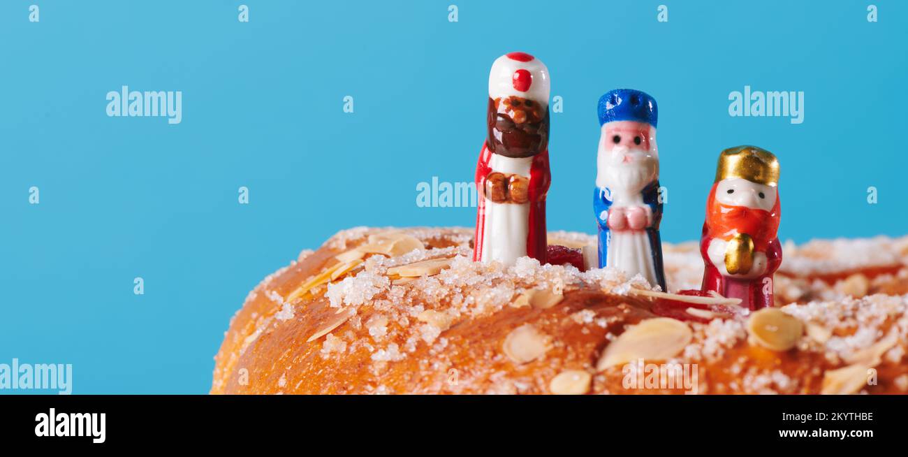 the three wise men, melchior, caspar and balthazar, on top of a roscon ...