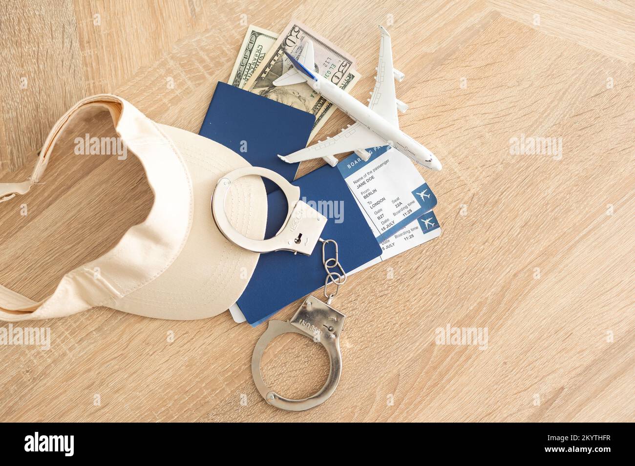passport, tickets, toy plane, handcuffs Stock Photo Alamy