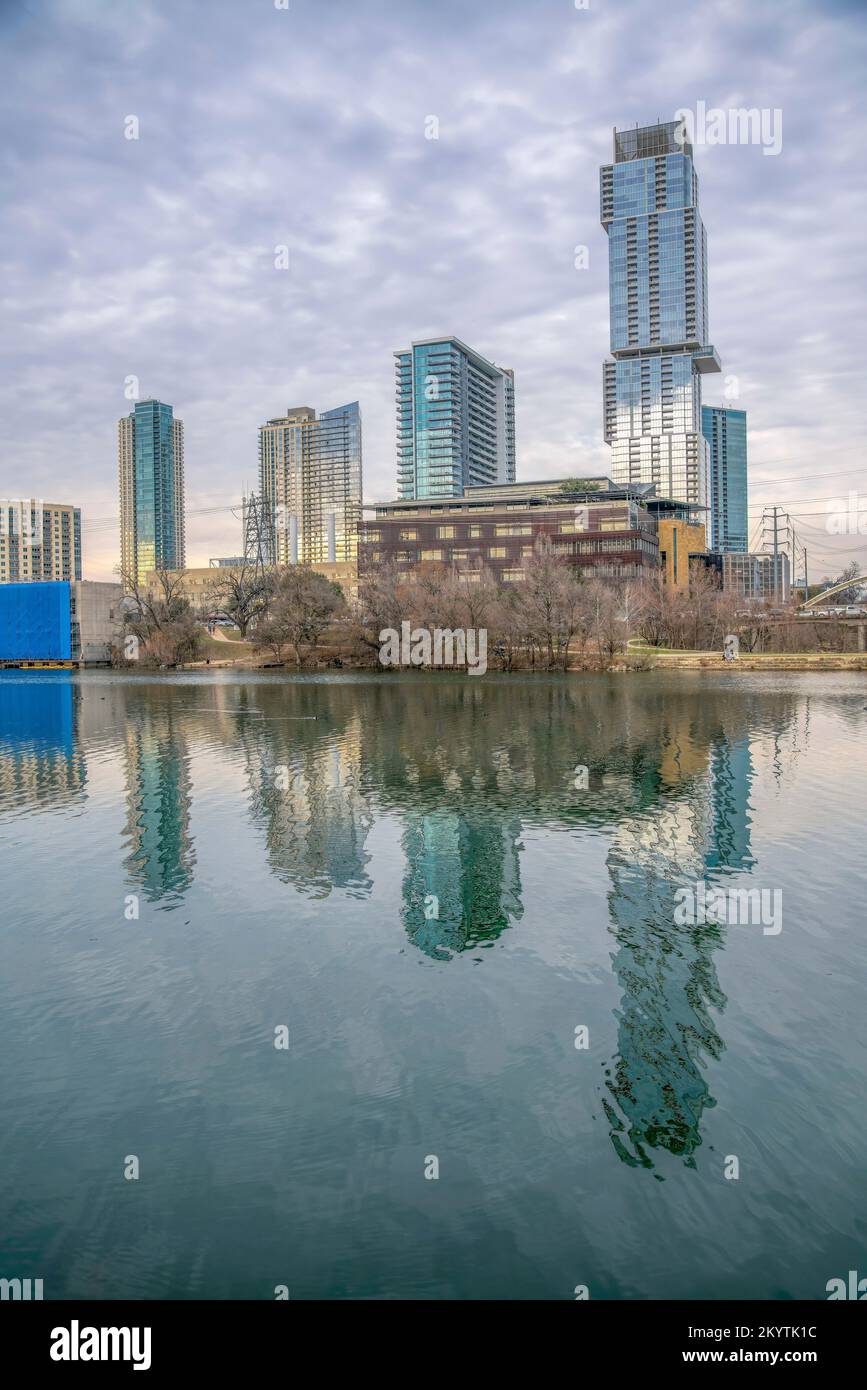 Colorado River waterfront with a reflection of the cityscape at Austin