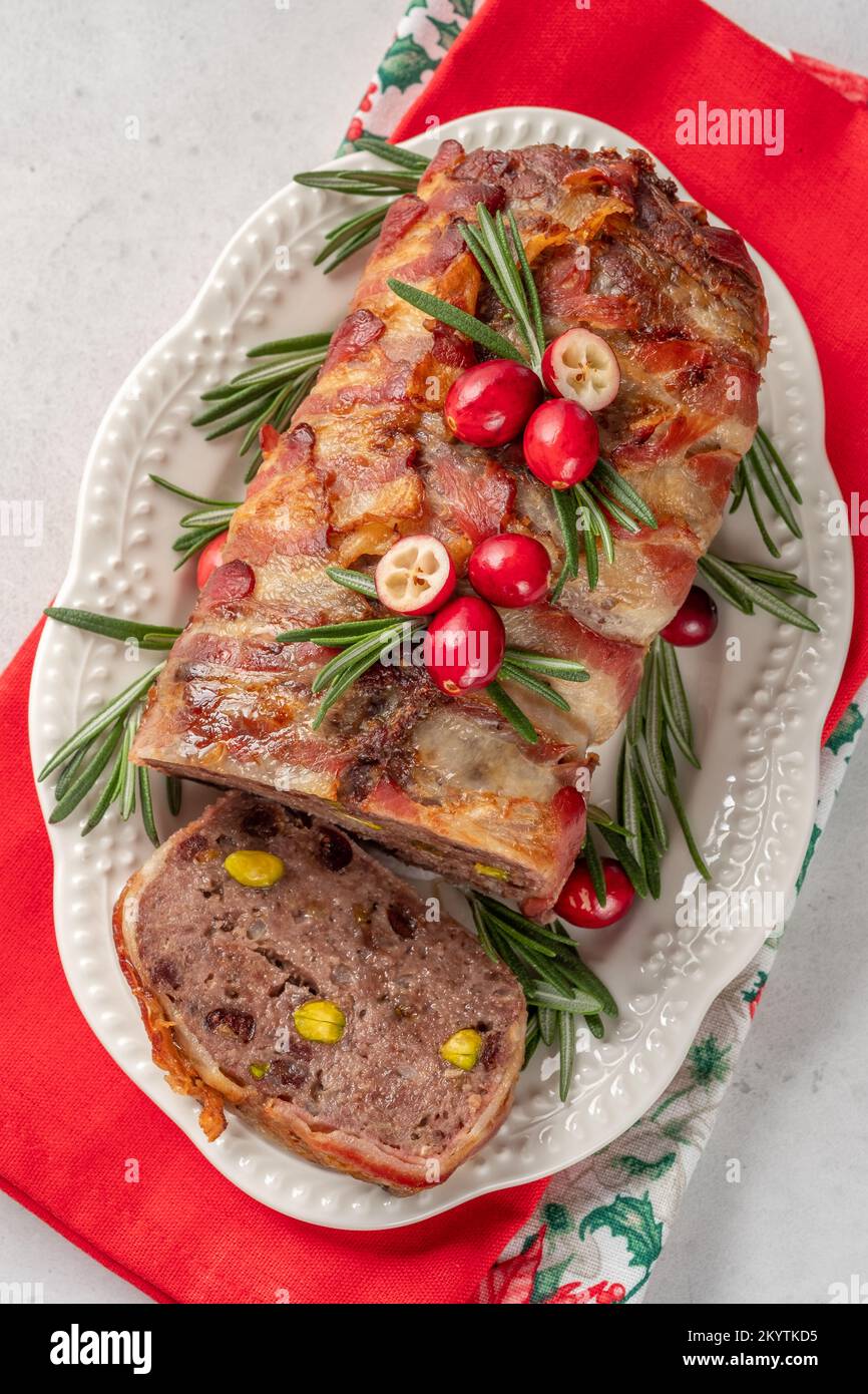 Terrine of pork with pistachios, cherries, chicken and bacon Stock