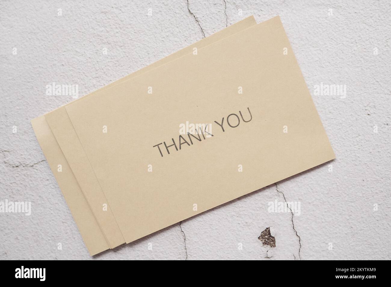 thank you message on a card on table  Stock Photo