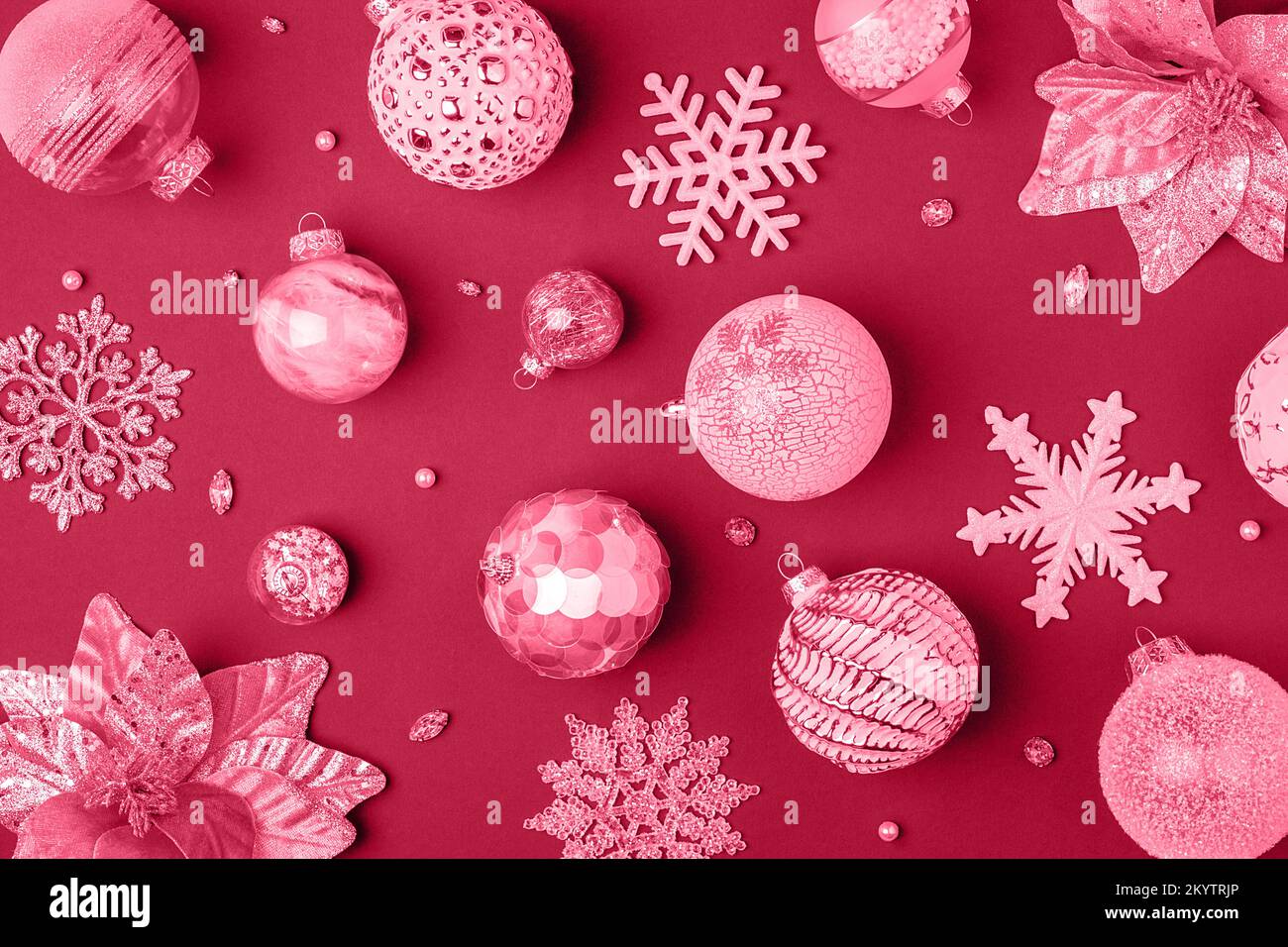 Trendy color of the year 2023.Holiday pattern made shiny christmas  decorations toned in viva magenta color Stock Photo - Alamy