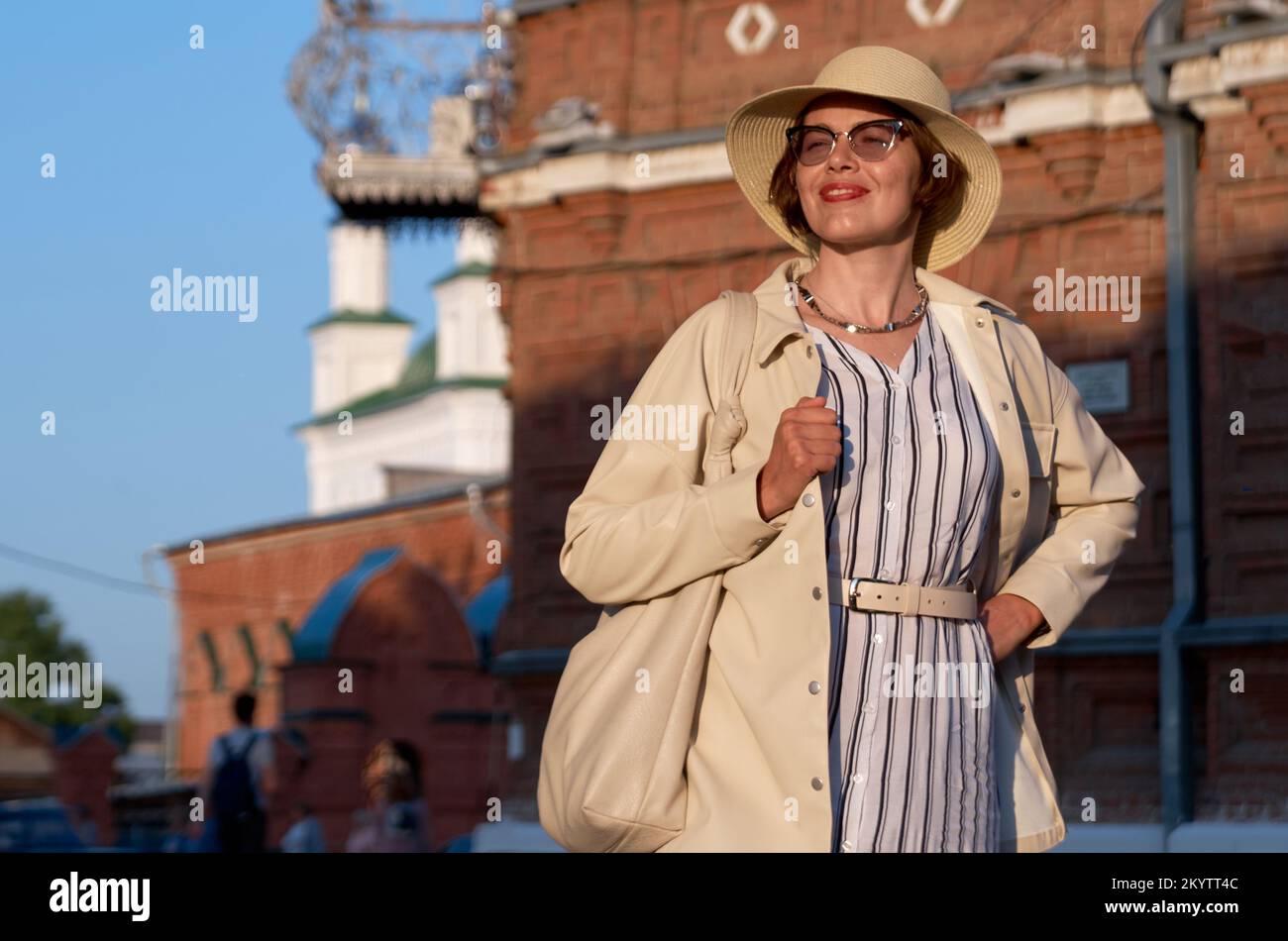 Woman in hat on street hi-res stock photography and images - Alamy