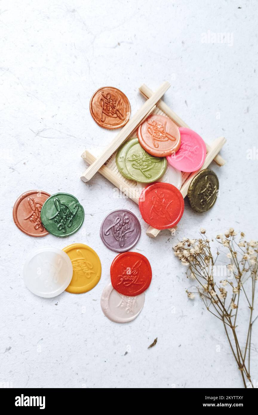 pretty wax coins for a vintage look for wedding or invitation decoration Stock Photo Alamy