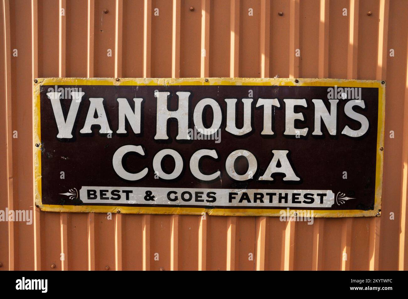 Enamelled metal sign, advertising Van Houten's cocoa photographed at Bishops Lydeard station on the West Somerset railway in Somerset,England, UK Stock Photo