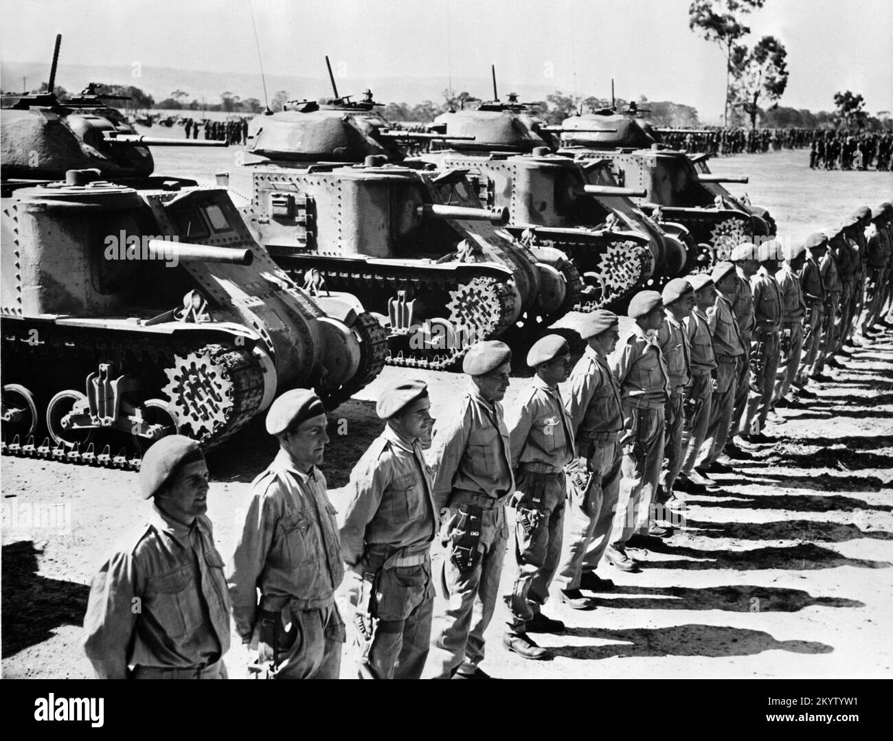 A vintage photo circa March 1943 of a line of American built M3 Grant medium tanks on parade in Australia during World War 2. These vehicles were provided under the lend lease scheme. Stock Photo