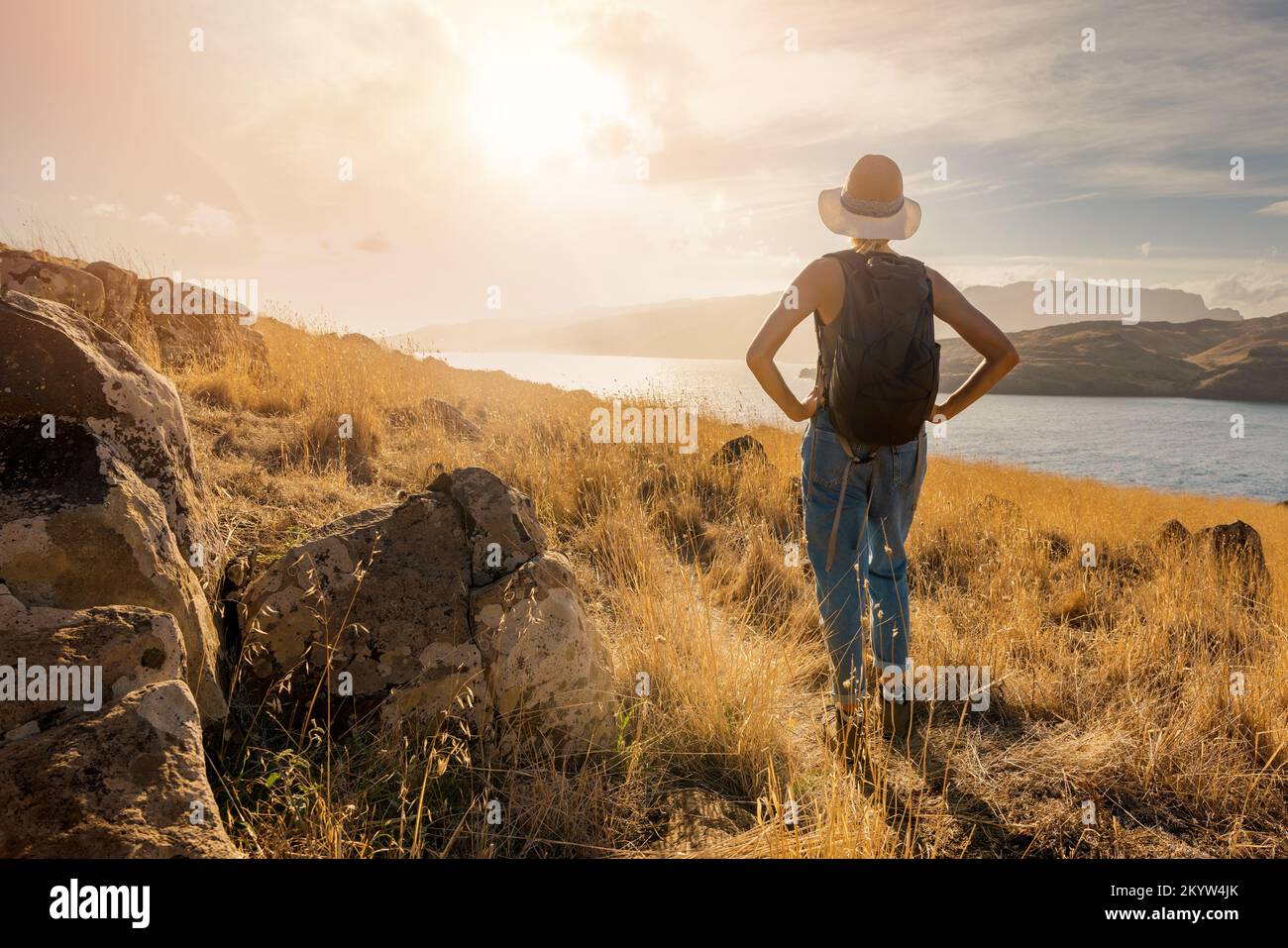 nature escape. woman on a wild hike in the mountains Stock Photo