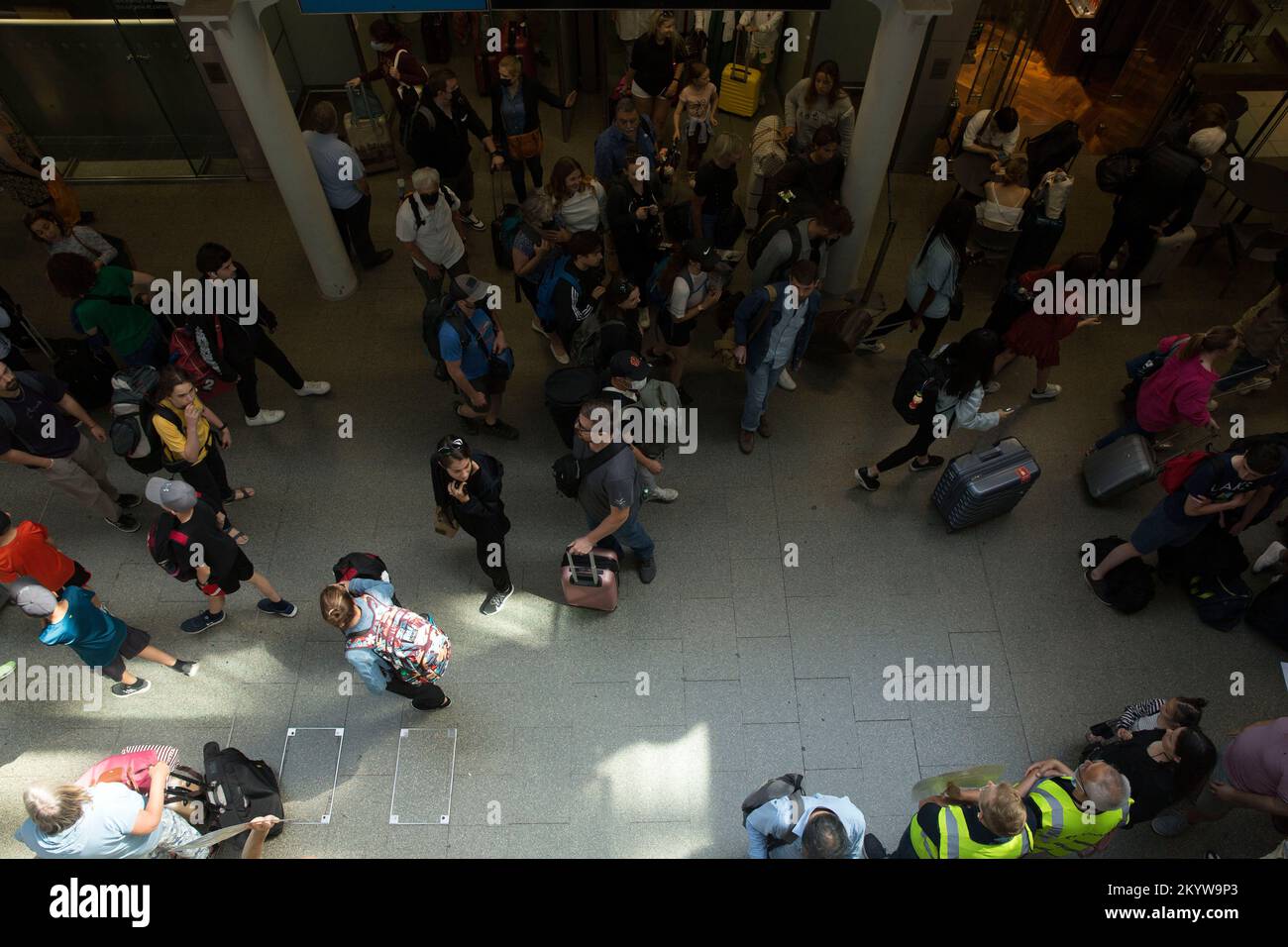 Passengers gather at St Pancras Station in central London, as many people are expected to go on holidays this weekend. Stock Photo