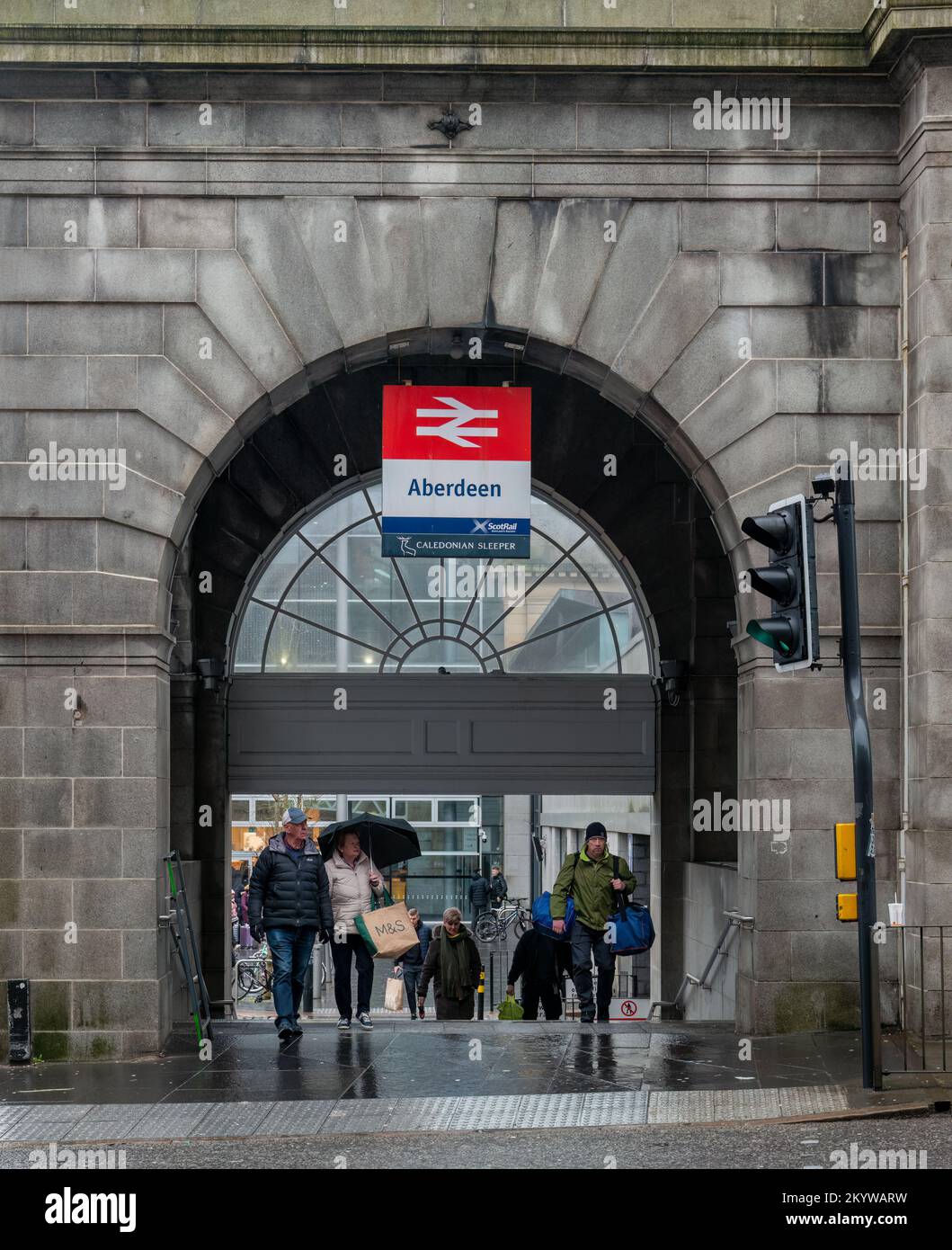 1 December 2022. Aberdeen,Scotland. This is people climbing up the steps from Aberdeen Railway Station to Guild Street on a grey day whilst raining. Stock Photo