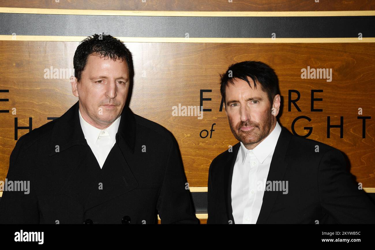 BEVERLY HILLS, CALIFORNIA - DECEMBER 01: (L-R) Atticus Ross and Trent Reznor attend Los Angeles premiere of Fox Searchlight Pictures 'Empire of Light' Stock Photo