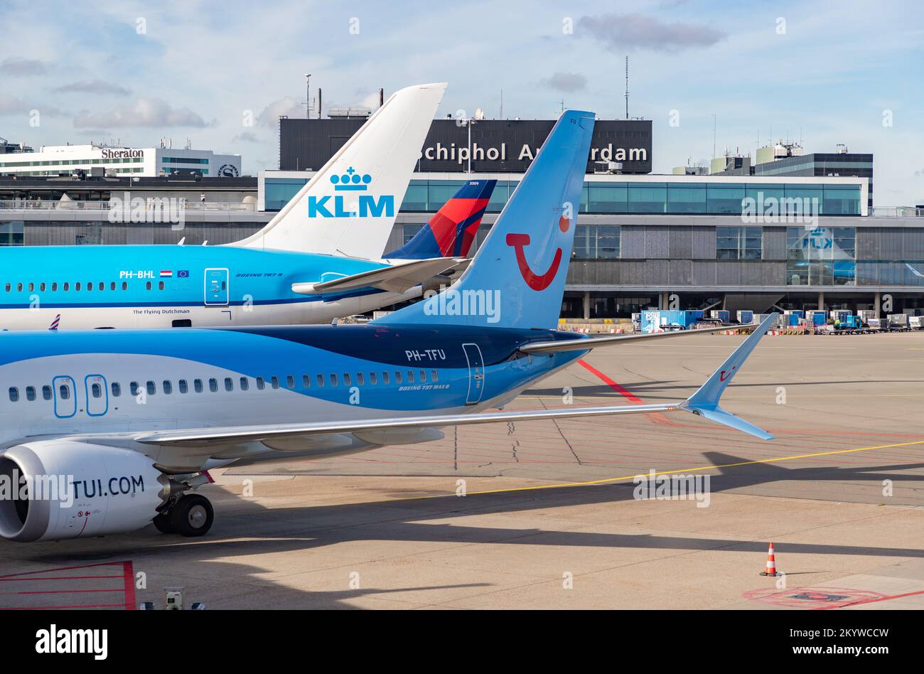 A picture of multiple planes in the Schiphol Airport. Stock Photo