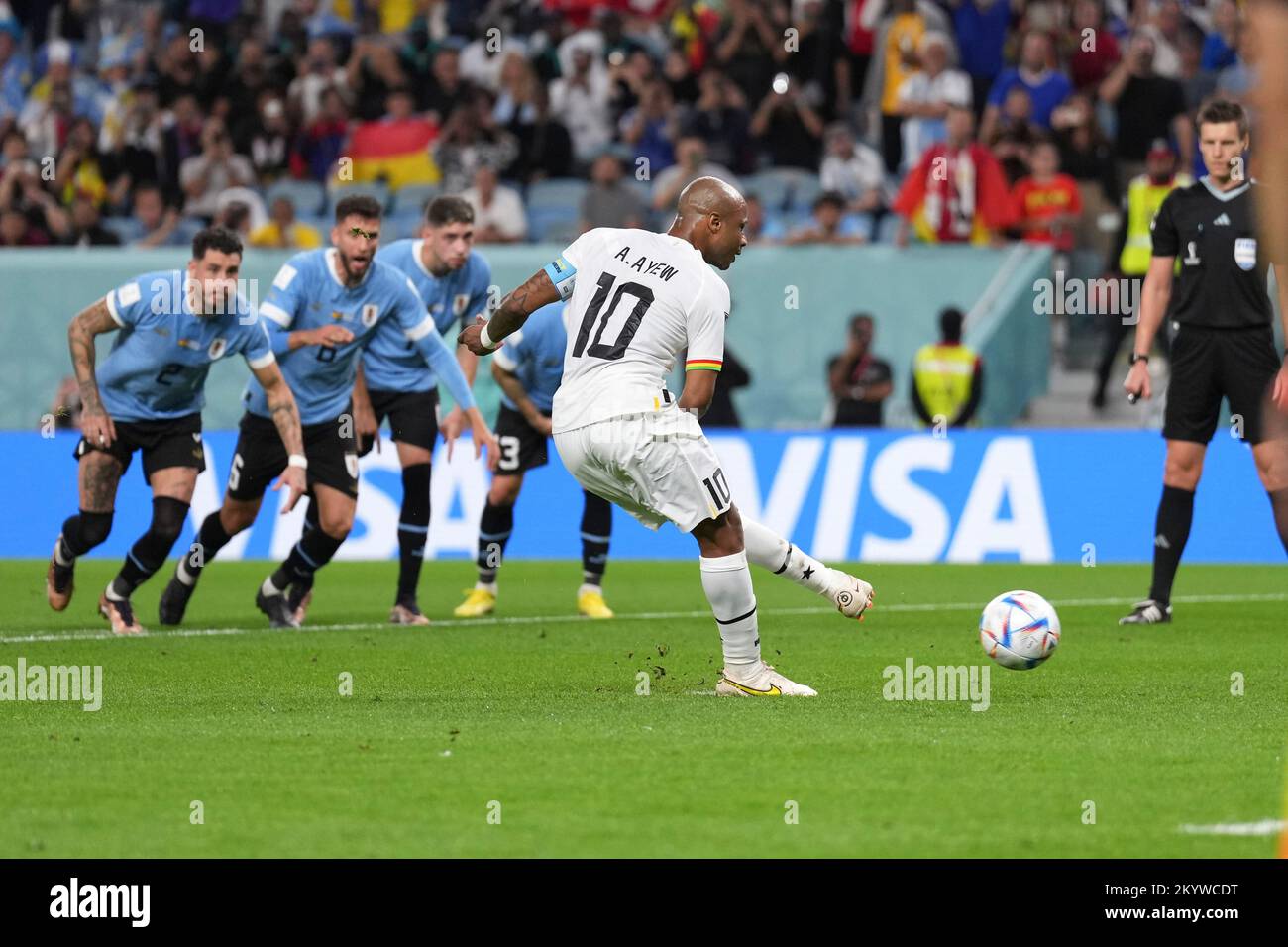Al Wakrah, Qatar. 2nd Dec, 2022. Andre Ayew of Ghana shoots a penalty kick which is saved by Uruguay's goalkeeper Sergio Rochet during the Group H match between Ghana and Uruguay at the 2022 FIFA World Cup at Al Janoub Stadium in Al Wakrah, Qatar, Dec. 2, 2022. Credit: Zheng Huansong/Xinhua/Alamy Live News Stock Photo