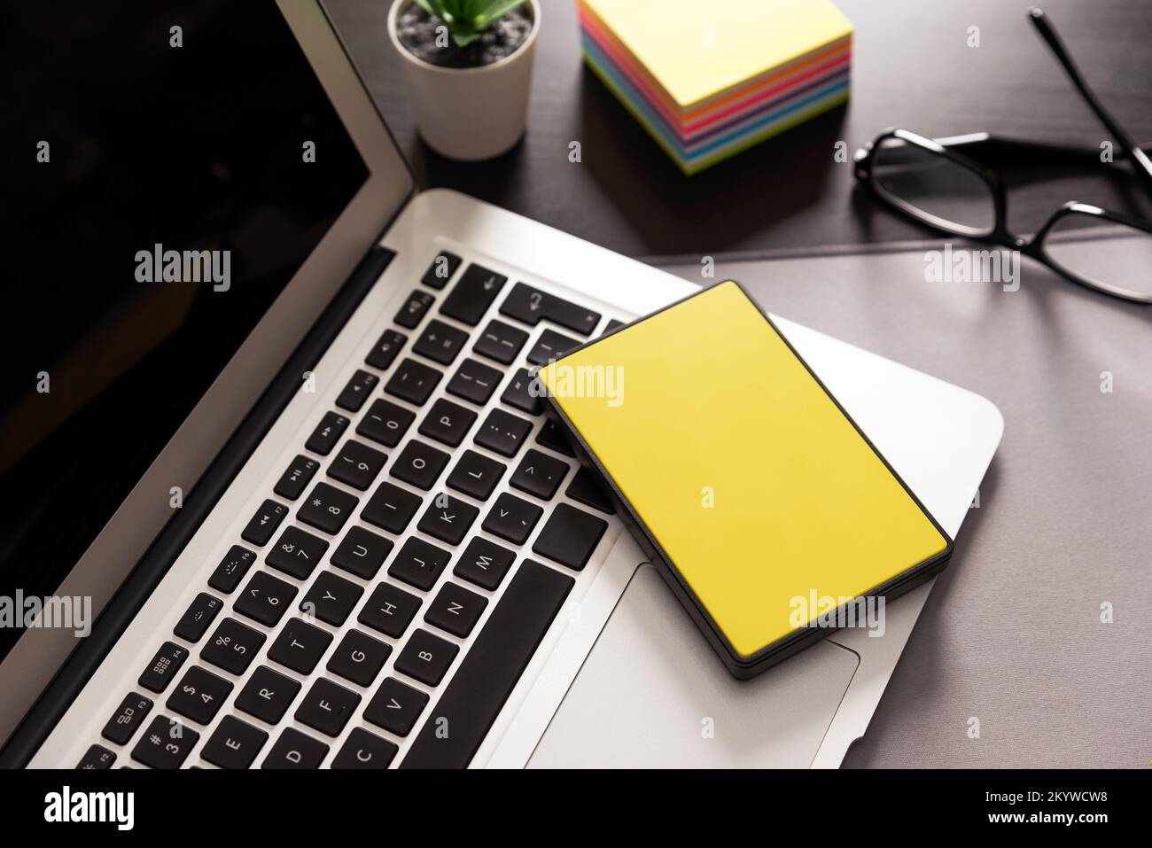 External hard disk connected to laptop. USB drive backup data Stock